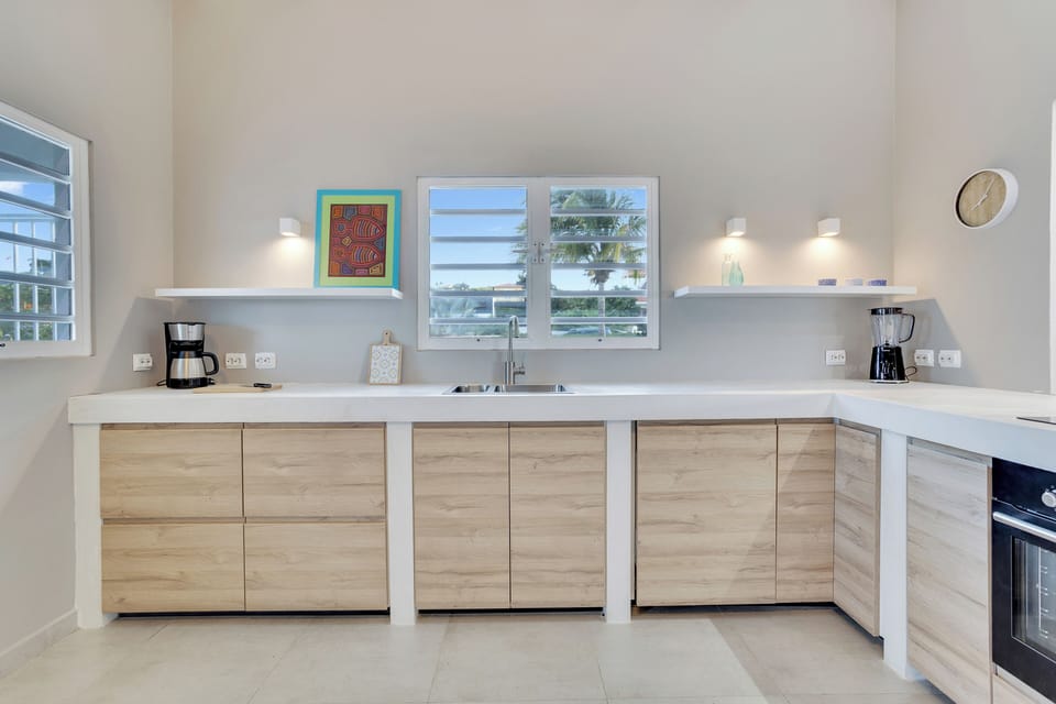 kitchen with coffe-maker and blender etc