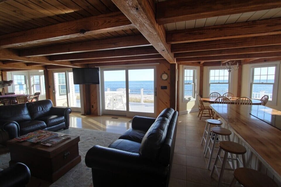 View looking over from kitchen towards living room, game room and oceanviews!