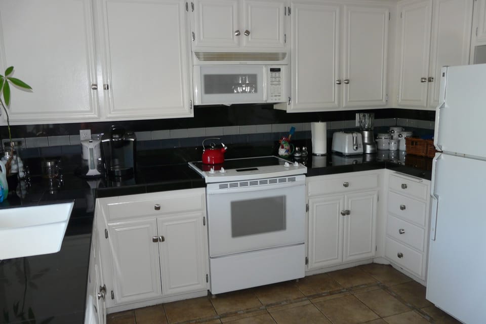 Kitchen is fully equipped. New tile. New gas burning stove.