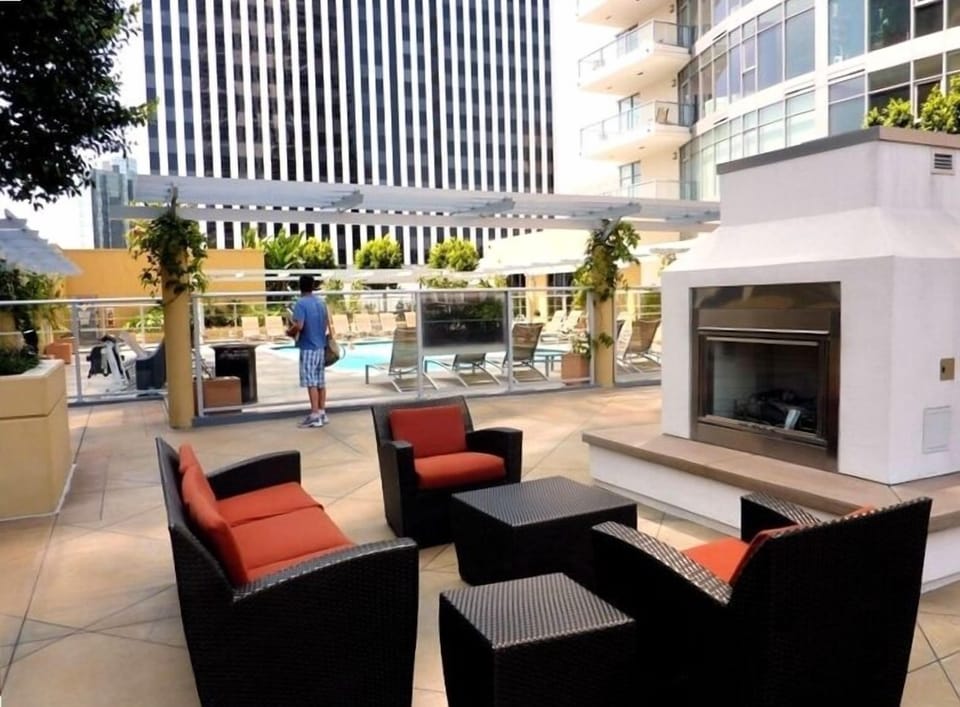 Beautiful Common Area with two outdoor fire places & BBQ's close to pool