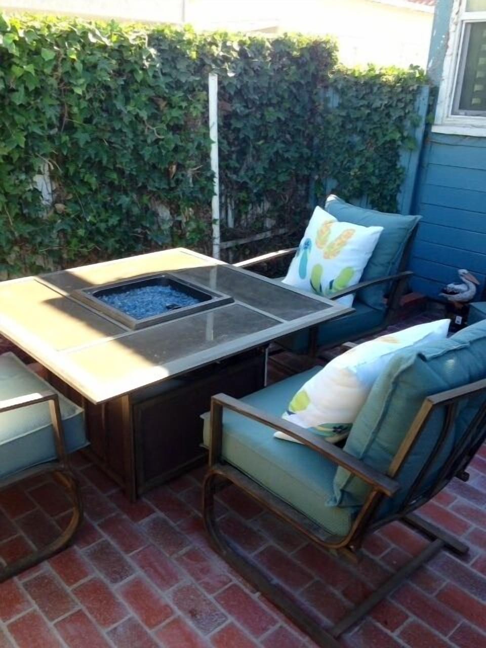 Fire pit with propane tank for quick lighting. Perfect for roasting marshmallows.  