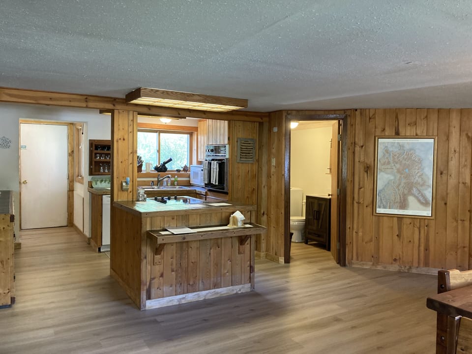 Updated flooring throughout the kitchen, living and dining rooms.