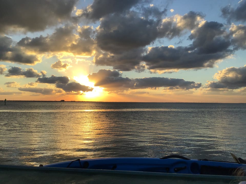 Sunset with clouds. View from living room balcony