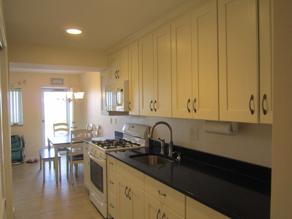 View of kitchen looking towards beach front door