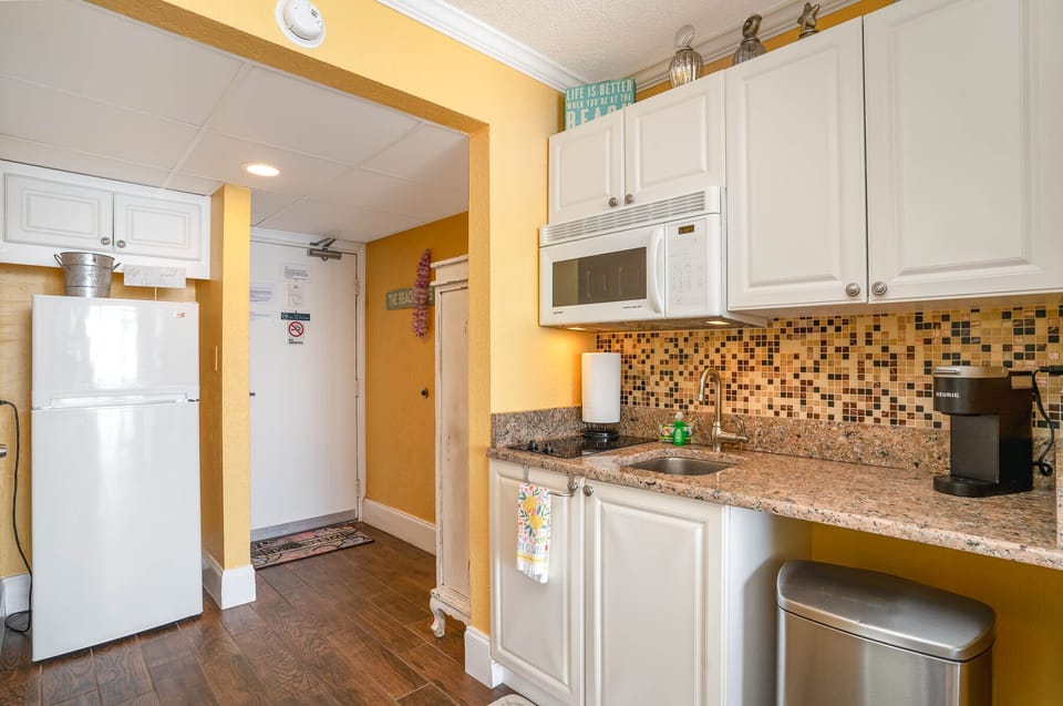 Full size fridge and galley kitchen