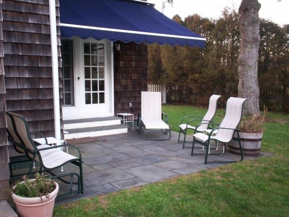 Patio outside of Dining Room,
Retractable Electric Awning Provides Morning Shade