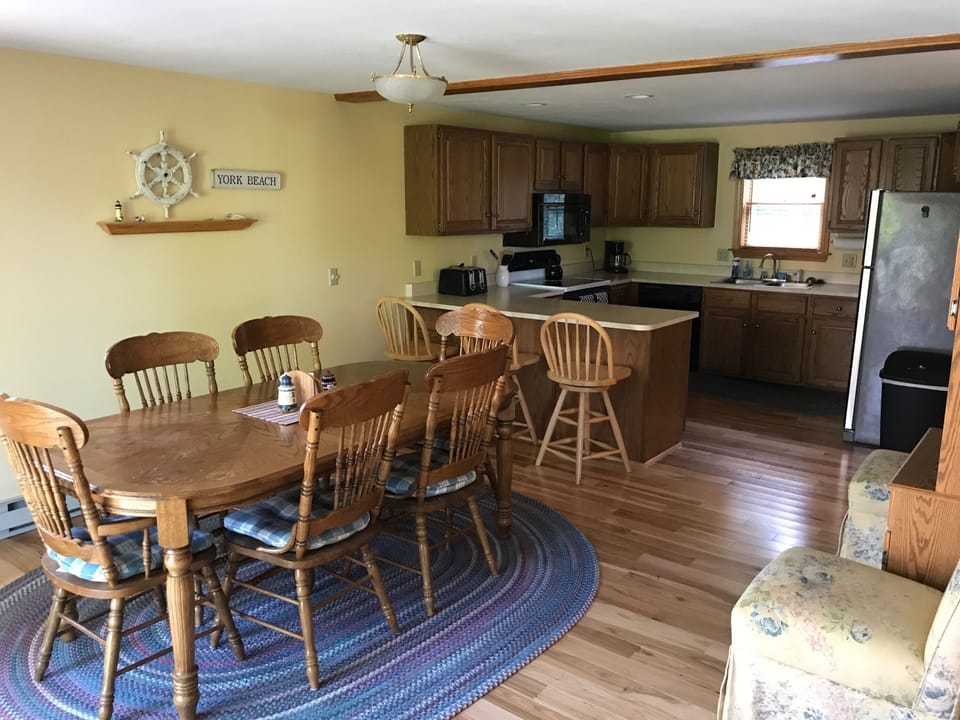 Kitchen and dining room.  Seating for 9.