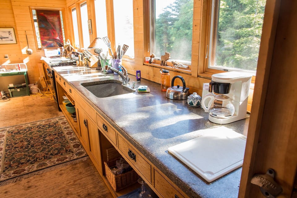Kitchen. Concrete countertops leave ample space for cooking and snackin