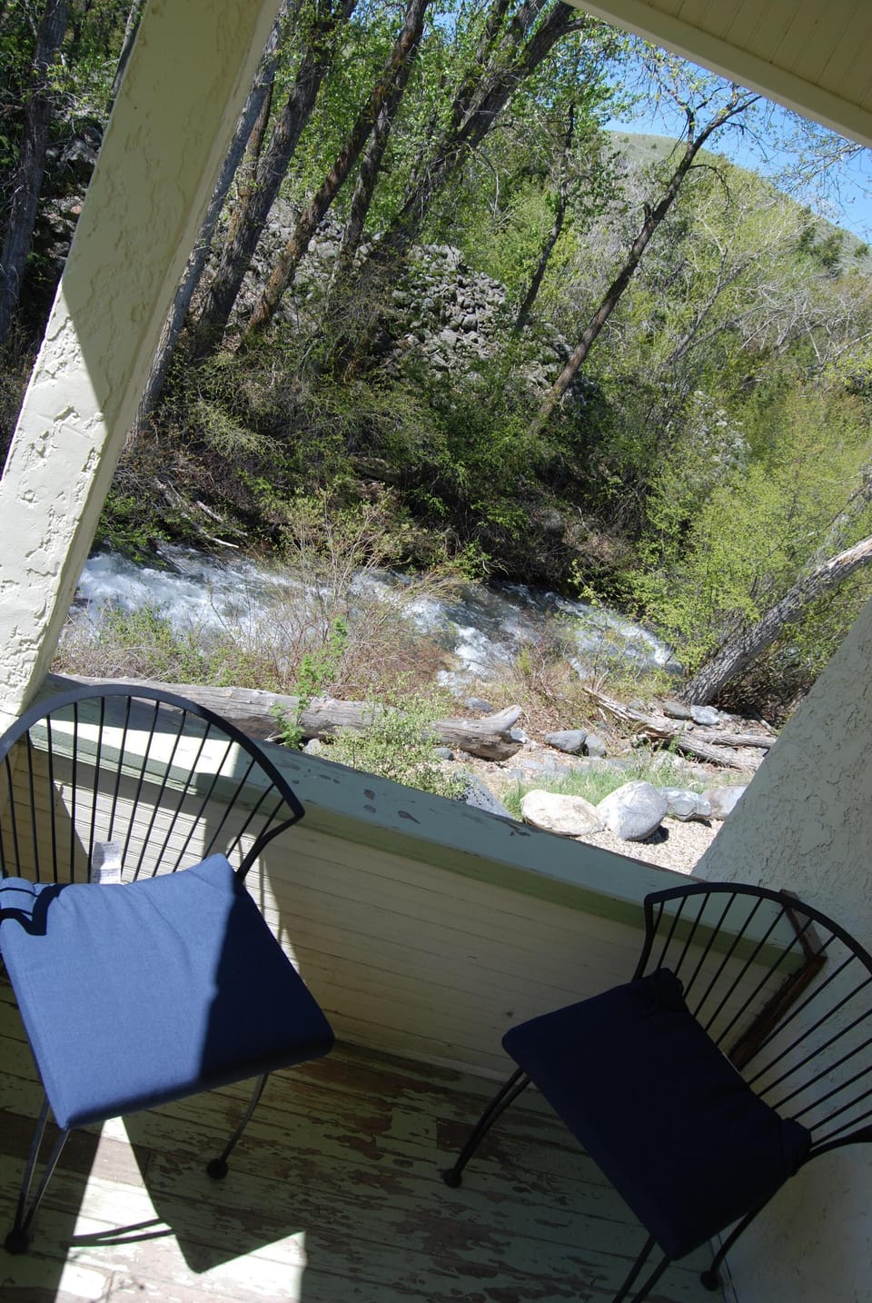 Covered porch overlooking the creek