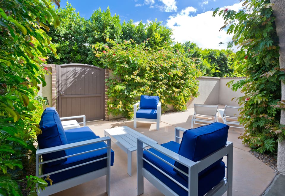 Courtyard past front gate, cozy comfy outdoor furniture