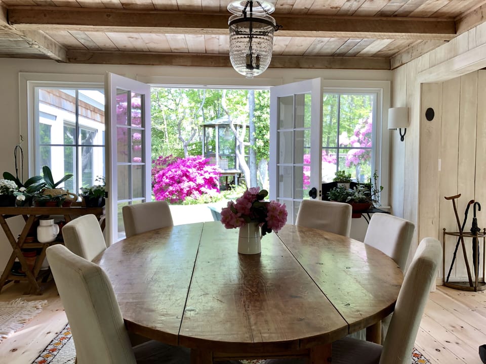 Dining room doors open to patio