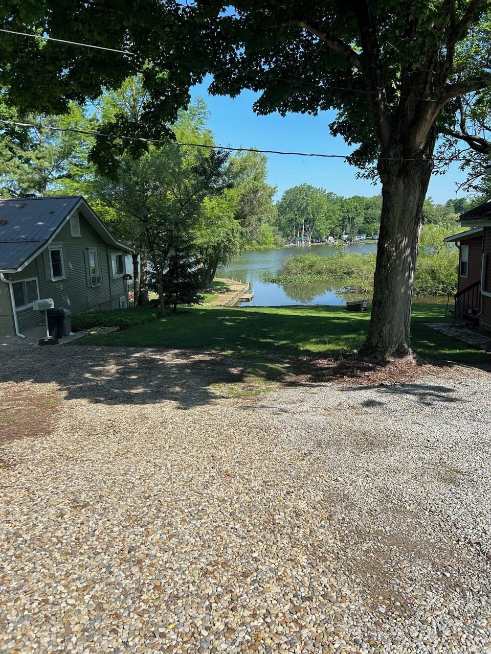 Gravel drive leading you to the parking area