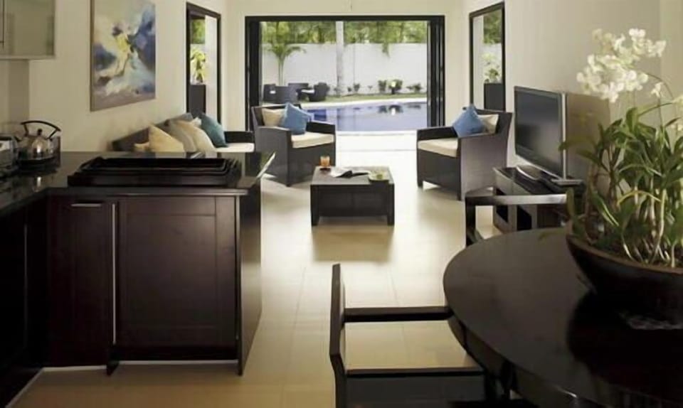 Spacious villa with separate bedrooms and living areas, suitable for large groups