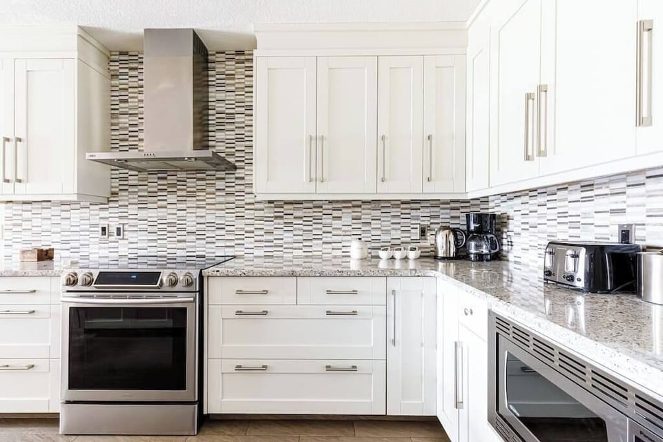 This kitchen is complete with local Rave coffee, a selection of Twinnings tea, sugar, milk and coffee whitener, as well as an array of appliances, serving dishes etc.