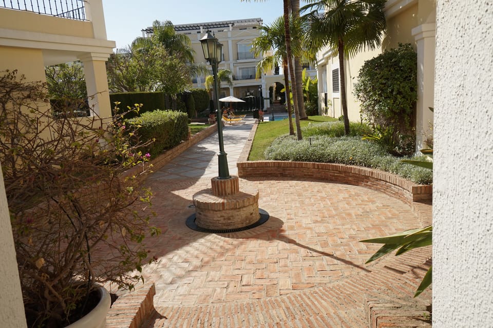 Looking out from the front door of the Town House towards the  Main  Pool.