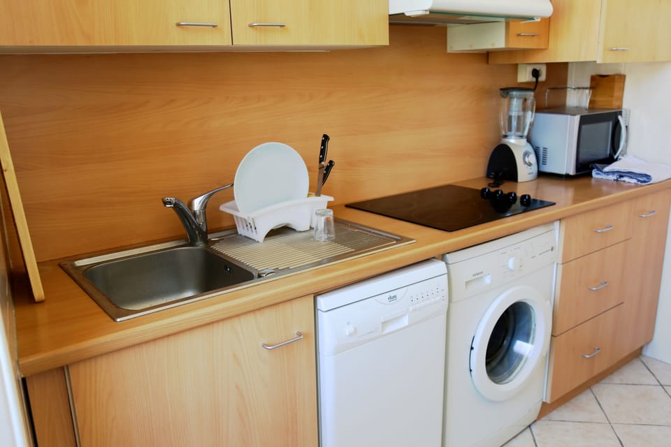 Separate fully-equipped kitchen