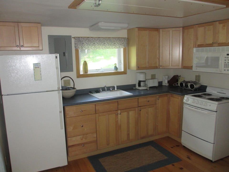 Pooh cabin modern kitchen area.