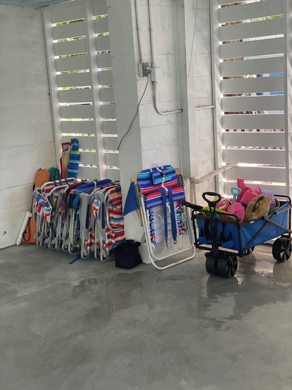 Beach chairs, umbrellas, some beach toys and wagon available for use.