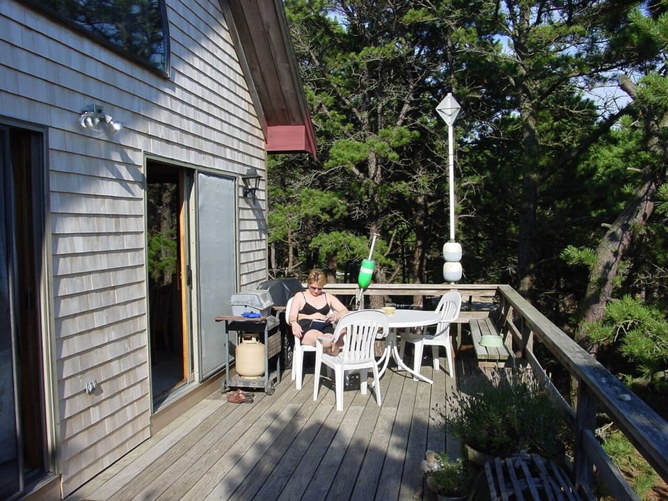 Relaxing on the deck, waiting for the chef to cook dinner on the grill