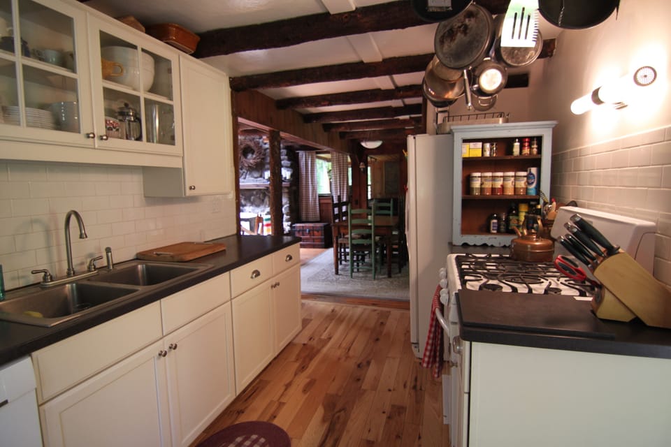 Kitchen looking into main room. Fully equipped. D/w, micrwave, toaster, cffemkr
