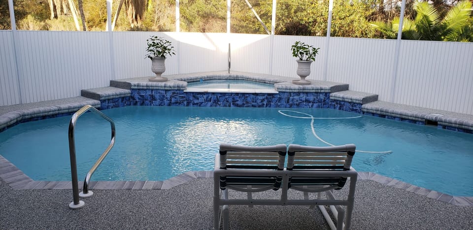 Newly remodeled pool with GLOW IN THE DARK RUBBER DECK