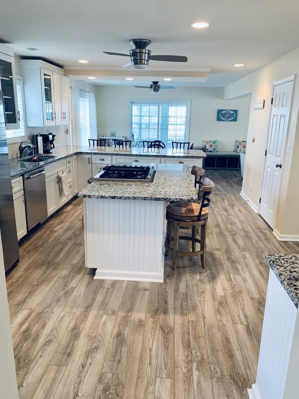 Fully appointed kitchen with open floor plan and views of the bay