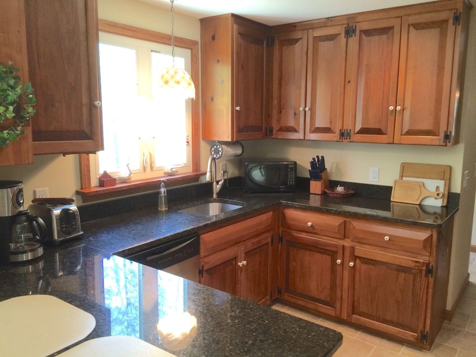 Recently remodeled kitchen with granite countertops
