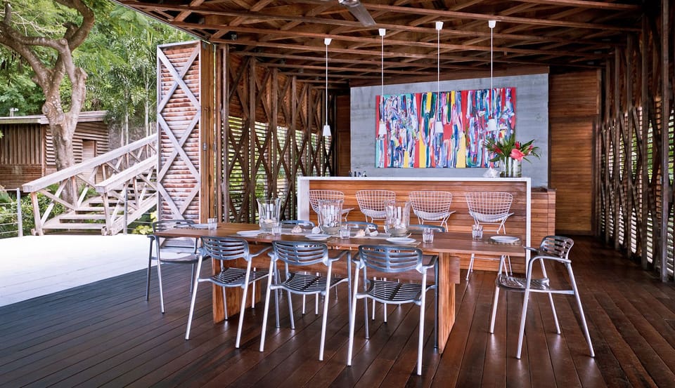 The expandable dining table in the Cantilever living space at Cosmos St Lucia