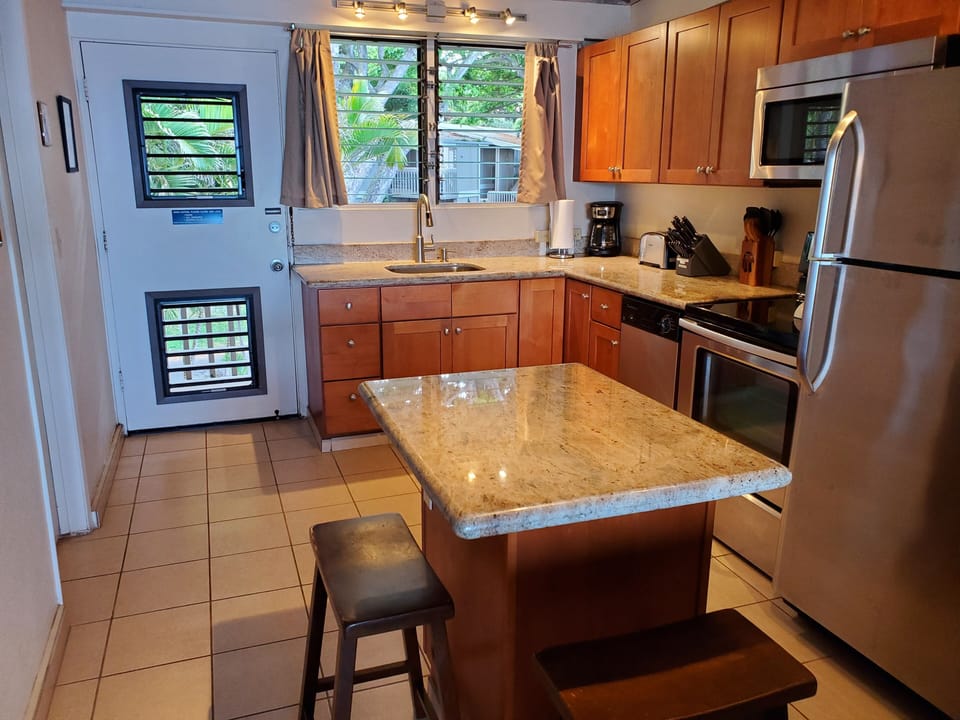 A beautiful kitchen for your cooking and dining convenience.