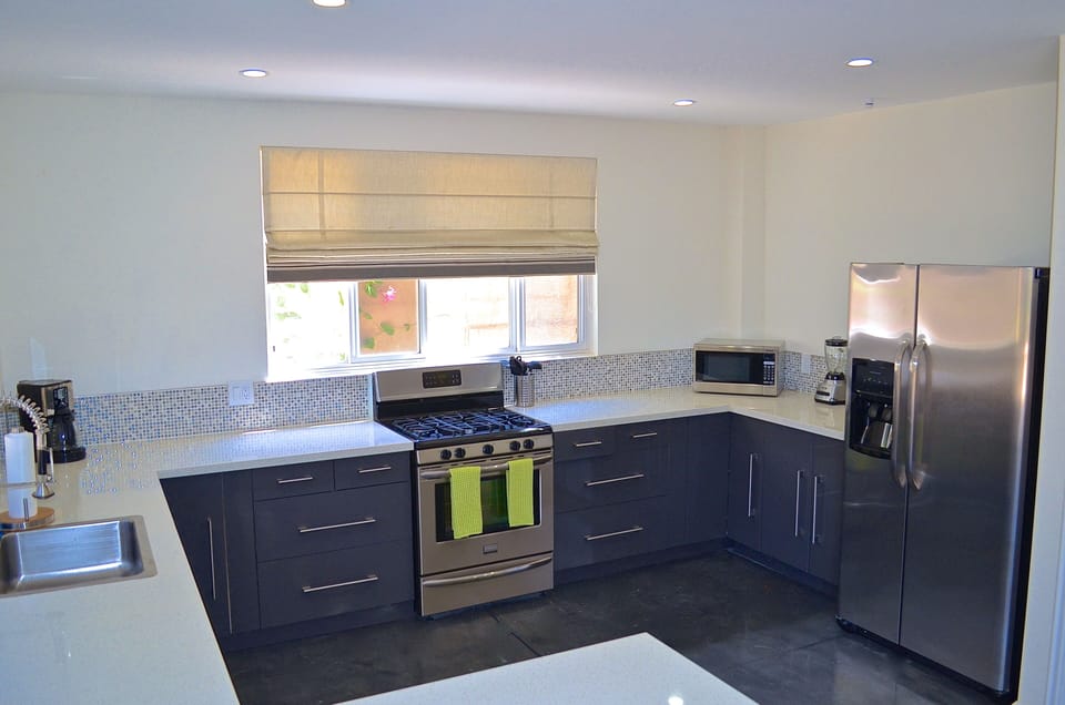 Huge kitchen, with stainless steel appliances, 
and quartz countertops!