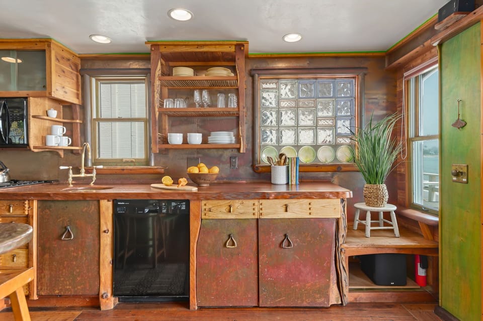 Copper, brass, and wood kitchen for cooking while on vacation