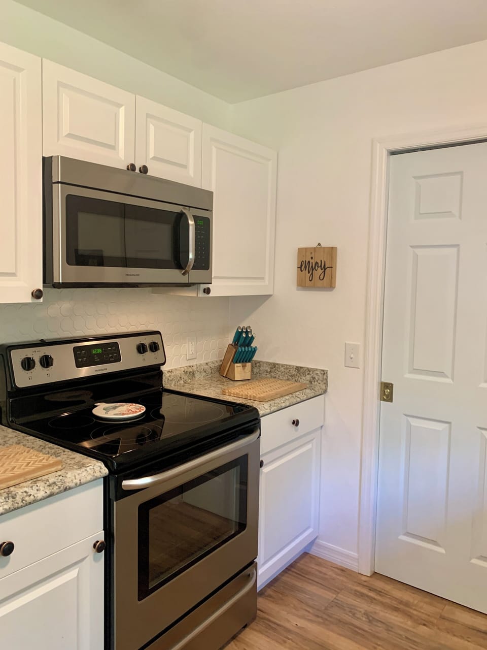 Stove & microwave, cutting boards and knives. Lots of kitchen storage & pantry.