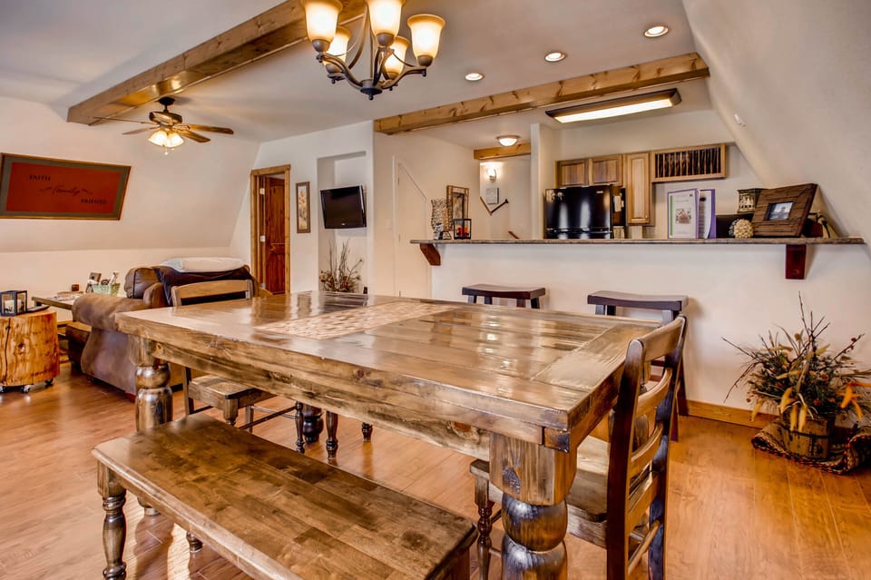 Open living room, dining room, and kitchen.