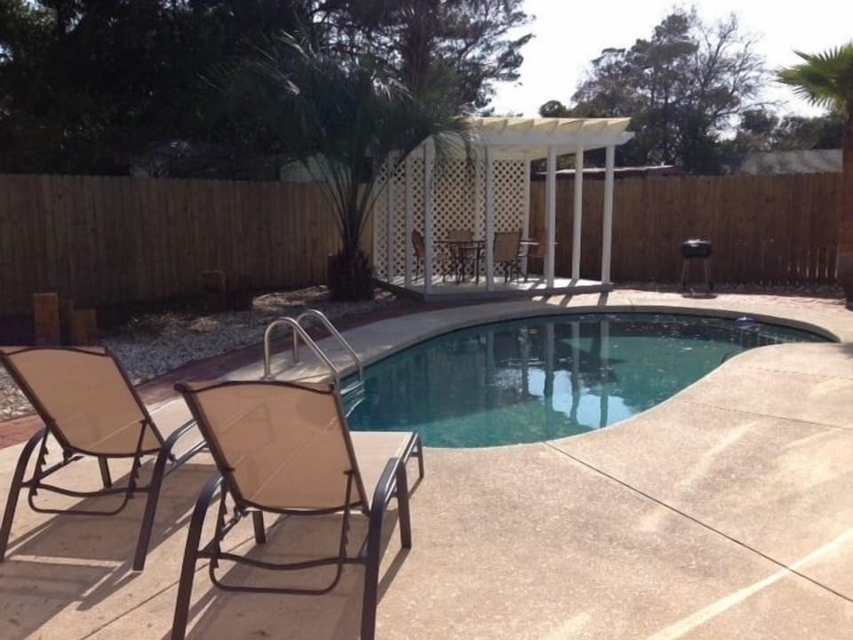 Kick back and relax in the comfortable reclining lounge chairs by the pool.