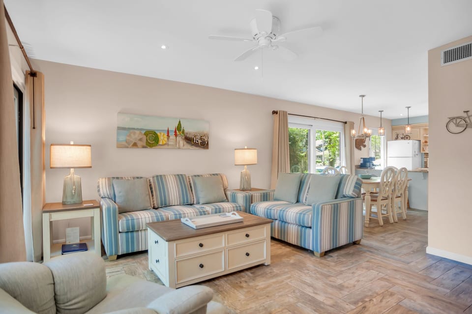Light-filled living area is open to dining and kitchen