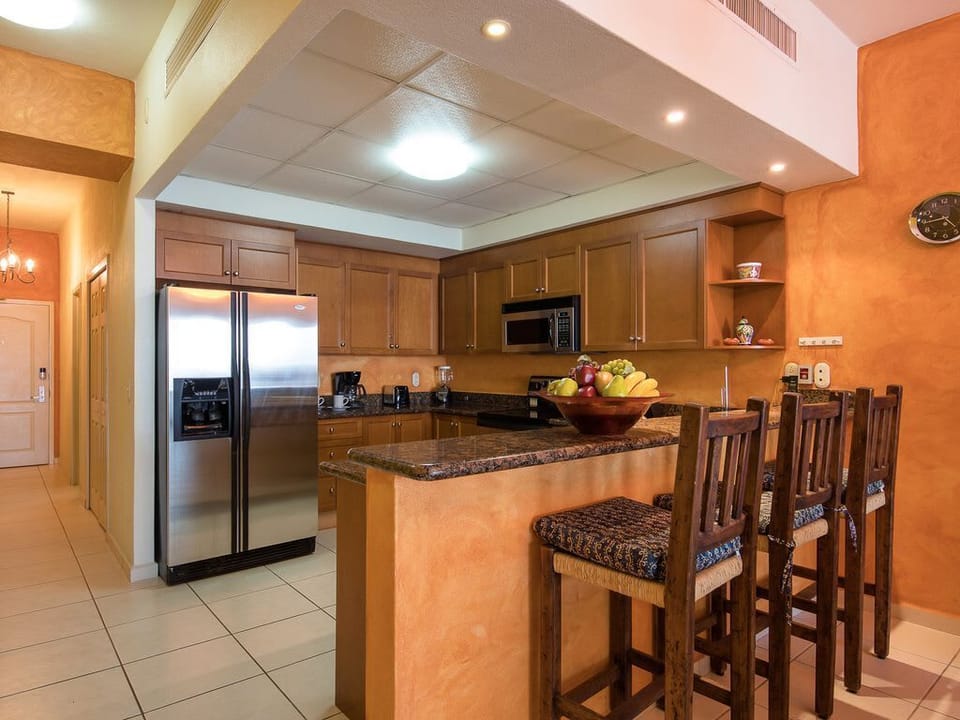 plenty of bar stools & great kitchen supplies..