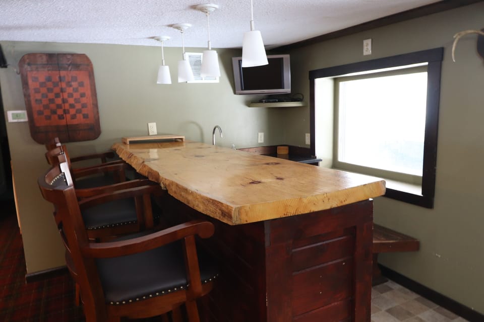 .....wet bar complete the space.  Now featuring a full size ice maker!