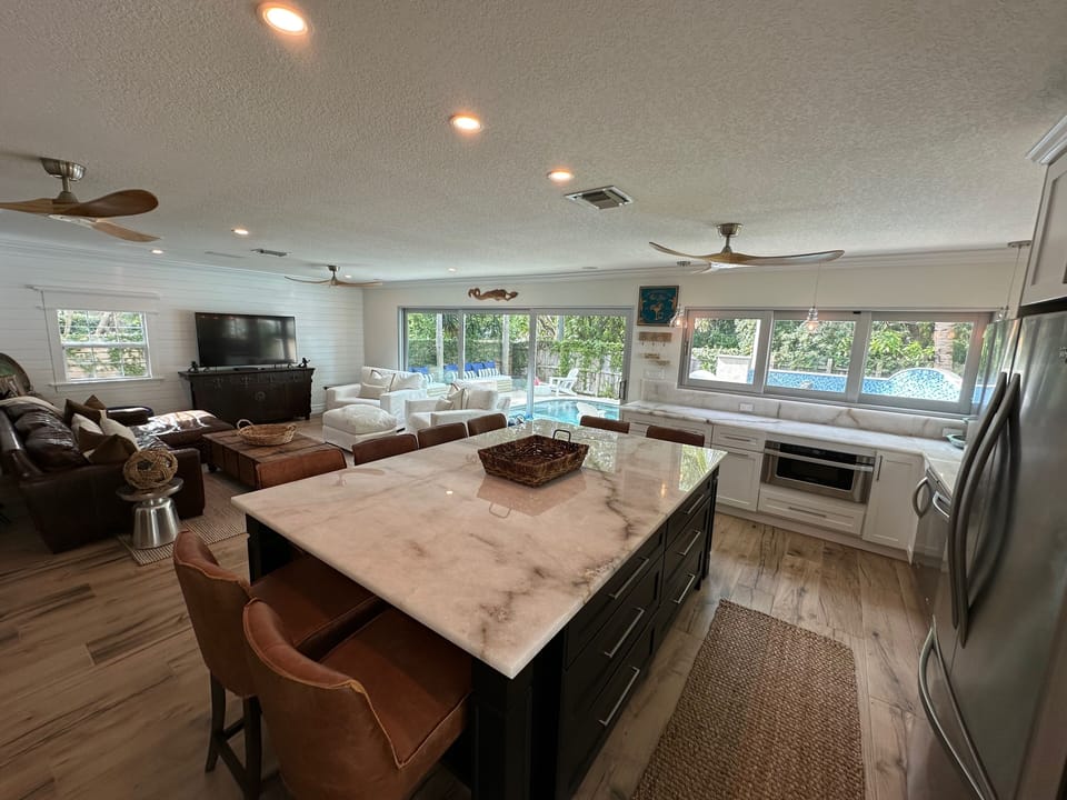 2nd living area & kitchen.  Doors & windows open creating an in/outdoor room.