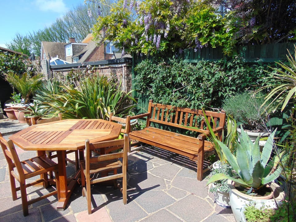 Patio with garden furniture ideal for outdoor meals and sunbathing