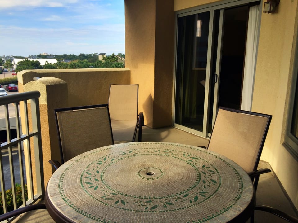 Large deck with lounger, table and chairs
