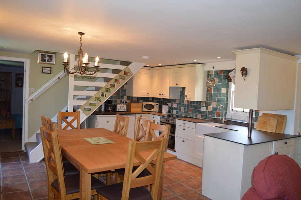 solid oak dining in modern kitchen