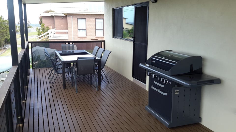 Balcony includes 8 seater table and BBQ