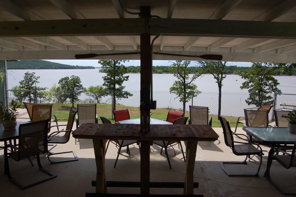 Lake view from the house & our newly constructed patio bar table (Spring 2020)