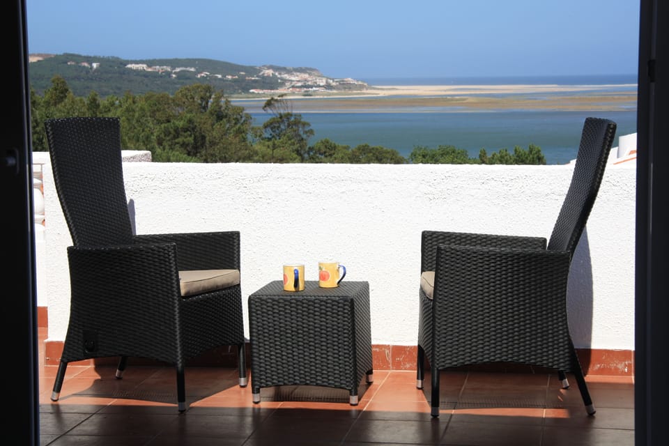 Tea for two watching the waves! Upper Terrace