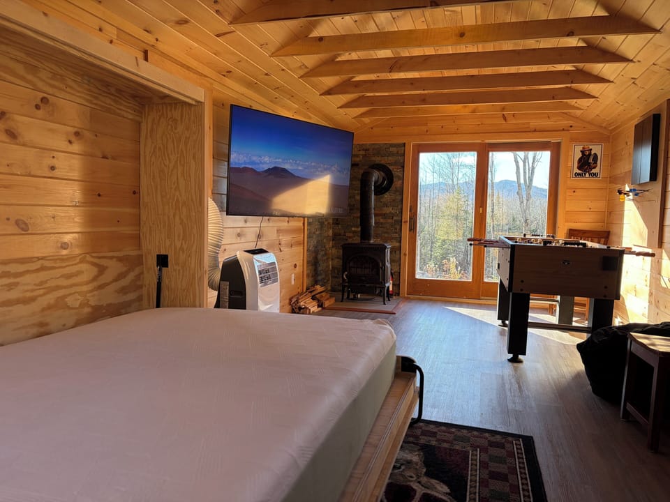 Enjoy the Murphy bed with wood stove or ac depending upon the season.
