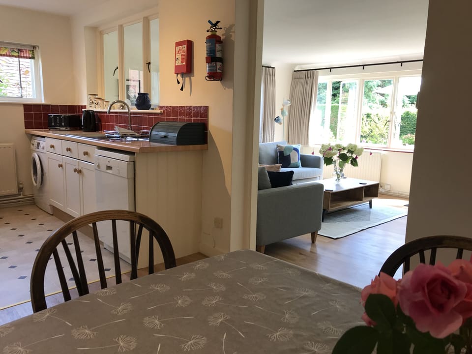 Kitchen and dining, one step down to sitting room