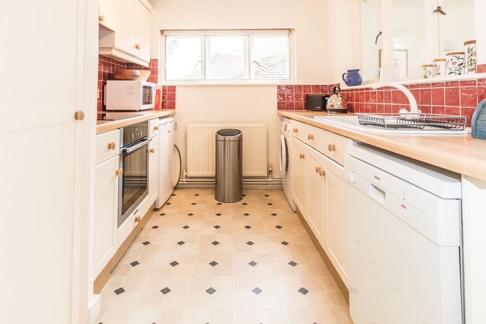 Open plan kitchen off dining area