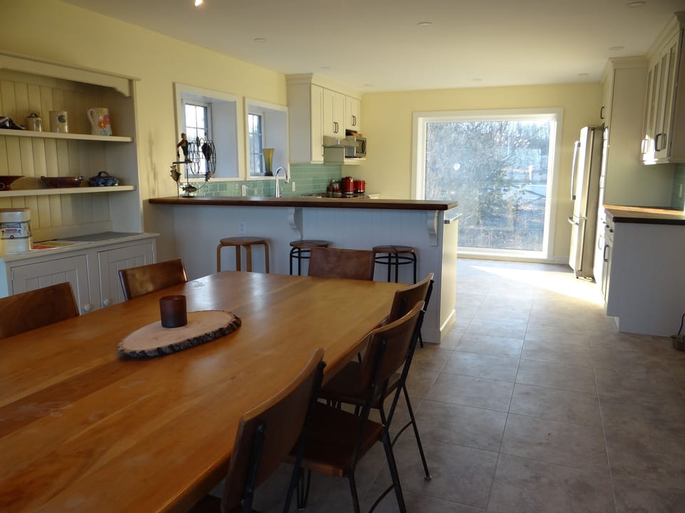 Cherry wood table sits 10