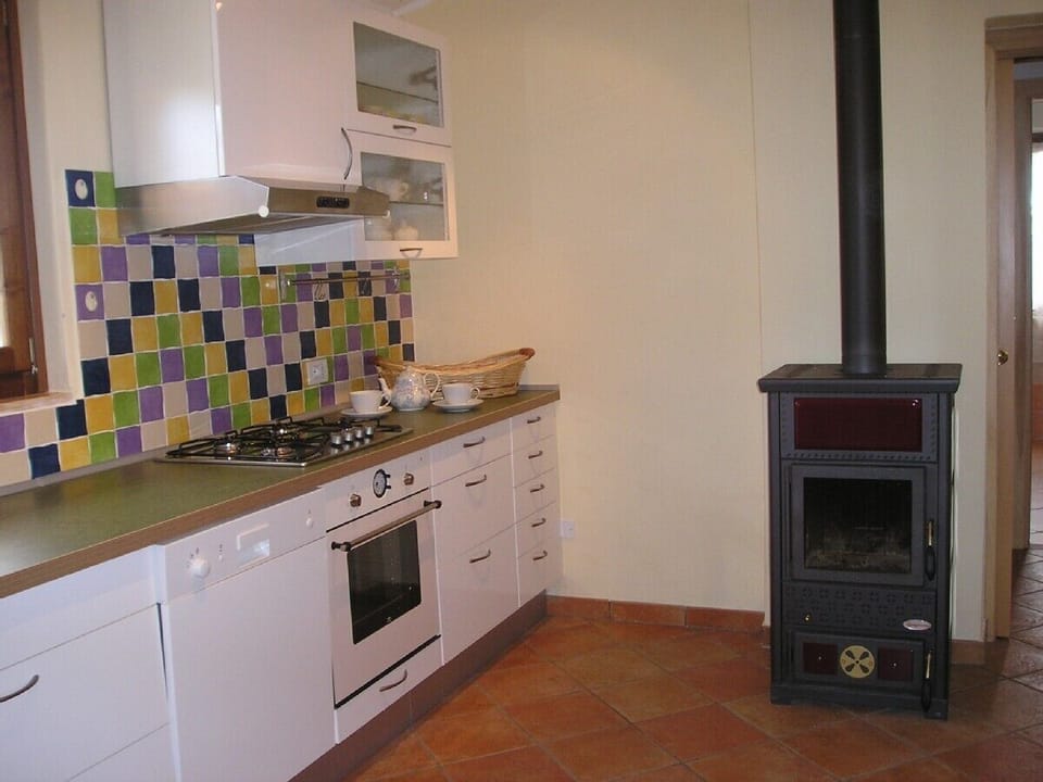 The kitchen and the wood stove