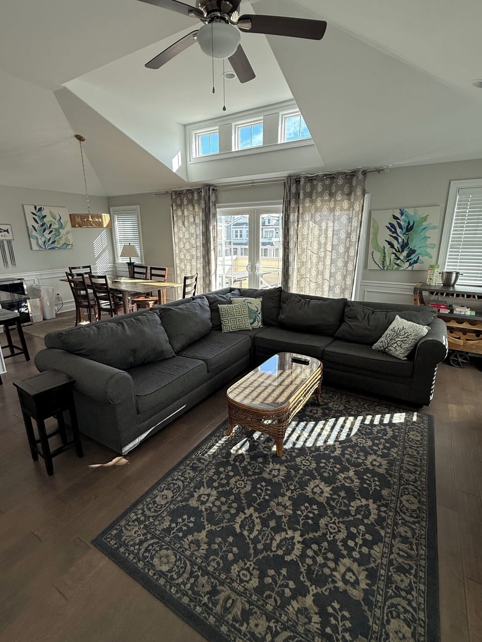 Living area has large comfortable sectional fireplace and large flat screen tv